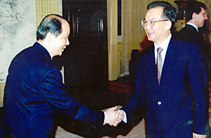 Permanent Secretary for Economic Development and Labour (Labour) Mr Matthew Cheung Kin-chung meeting Premier Wen Jiabao at Zhongnanhai during his attendance in the China Employment Forum. 