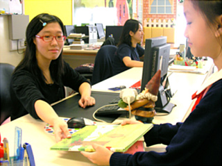 A trainee works as a library assistant under the "IT Seeds Project".