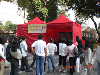 An information kiosk staged to publicise the rights and benefits of foreign domestic helpers.