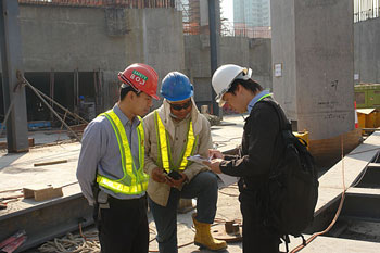 An Occupational Safety Officer conducting inspection at a construction site.