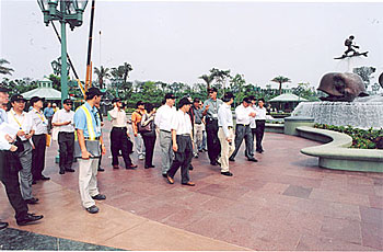 Members visit the Hong Kong Disneyland.