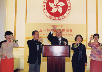 Chief Executive, Mr Tung Chee Hwa; the Chief Secretary                          for Administration, Mr Donald Tsang (second from                          left); the Secretary for Justice, Ms Elsie Leung                          (second from right); the former Secretary for Education                          and Manpower, Mrs Fanny Law (first from left); and                          the Commissioner for Labour, Mrs Pamela Tan (first                          from right) proposing a toast at the Labour Day                          Reception.