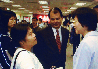 The                          Commissioner for Labour, Mrs Pamela Tan (first from                          right); and the Permanent Secretary for Economic                          Development and Labour (Labour), Mr Matthew Cheung                          (second from right); obtaining job-seekers' views                          on the department's employment services.