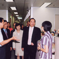 The                          Financial Secretary, Mr Antony Leung (left photo);                          and the Secretary for Economic Development and Labour,                          Mr Stephen Ip (lower photo); paying familiarisation                          visits to Labour Department offices to enhance communication                          with staff. B