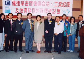 The Assistant Commissioner for Labour, Mrs Jennie Chor (fifth from left), with the construction tripartite committee members at a seminar for the industry.