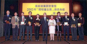 The Permanent Secretary for Economic Development and Labour, Mr Matthew Cheung Kin-chung (centre), pictured with 10 winners of the "Enlightened Employers Award".