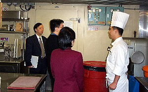 Adjudicators of the Catering Industry Safety Award Scheme assessing safety and health performance of a participating establishment.