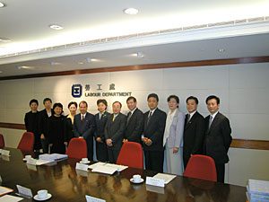 A 6-member delegation led by the Deputy Director-General of the Ministry of Labour and Social Security of the State Council, Ms Zhang Yali (sixth from left), visiting the Labour Department in October 2004. 