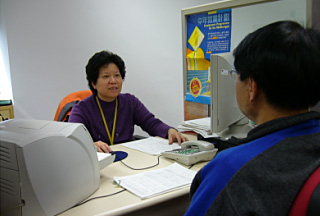 A placement officer provides employment counselling service to a job-seeker under the Job Matching Programme.