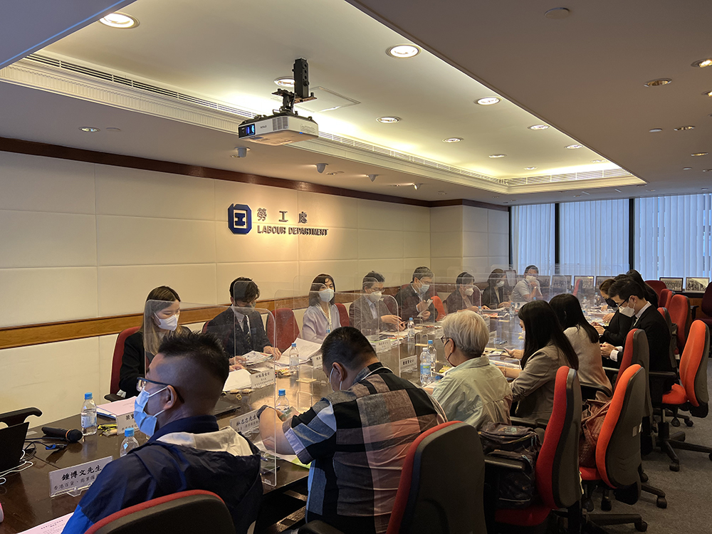 Members of an industry-based tripartite committee discussed issues of common concern to their industry at a meeting