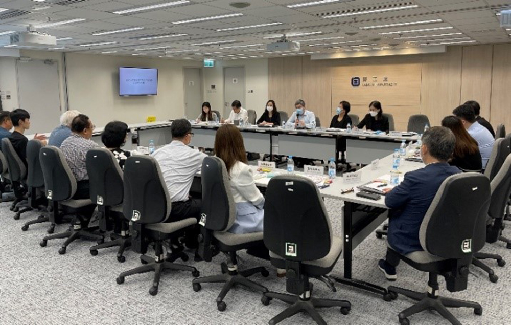 Members of an industry-based tripartite committee discussed issues of common concern to their industry at a meeting